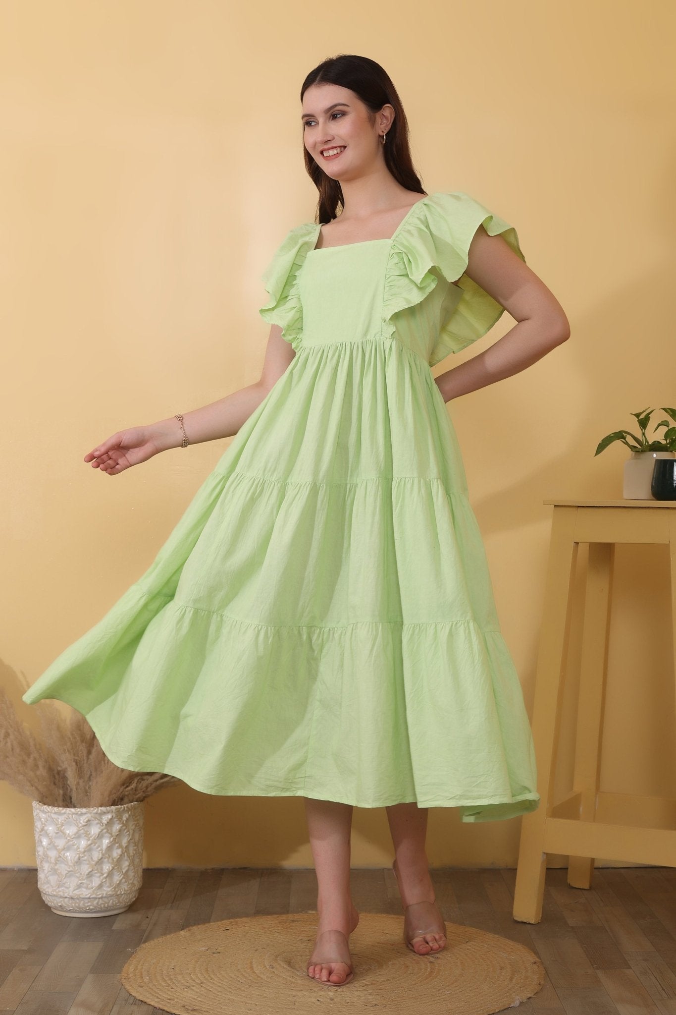 Clover Charm - Pistachio green cotton poplin midi dress featuring elasticated ruffle shoulder straps, square neckline, and a tiered, flowy silhouette for comfortable romantic styling.
