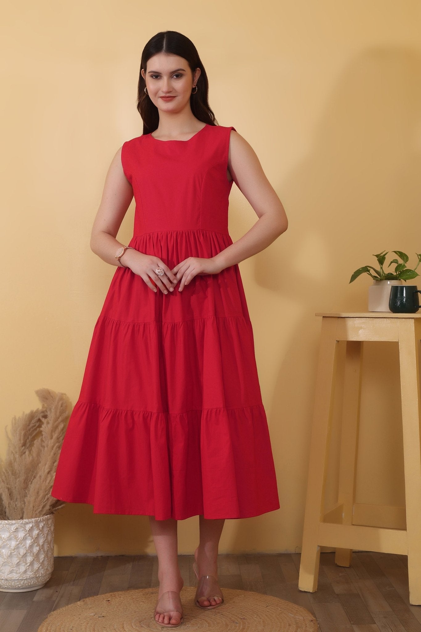 Scarlet Whimsy - Bold red cotton poplin dress with sleeveless fit-and-flare shape, tiered hem, and a dramatic open back detailed with a tie-up bow closure.
